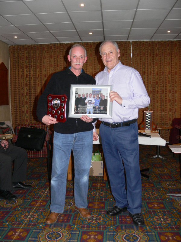 St Anthonys A Captain (Mick Rainford) receives the Div.1 Chairman's Plate Trophy